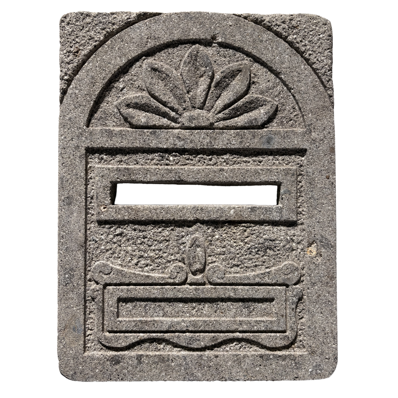 Built-in mailbox for masonry walls, made of travertine or peperino.